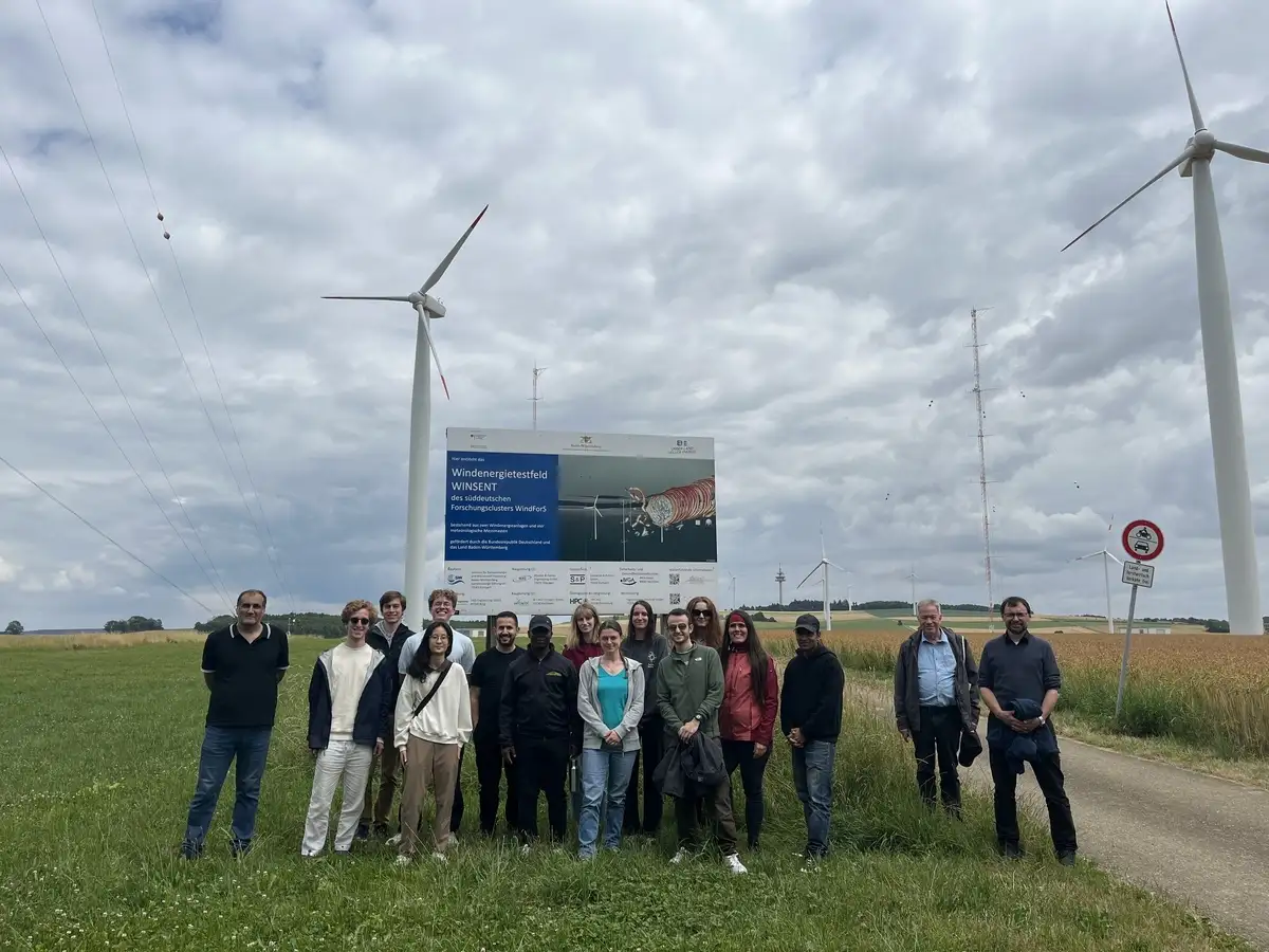 Group photo of the excursion participants at the WINSENT test site